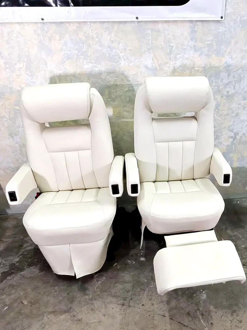 Reupholstered RV captain chairs